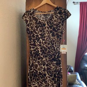 Ladies new with tags tea length leopard print dress